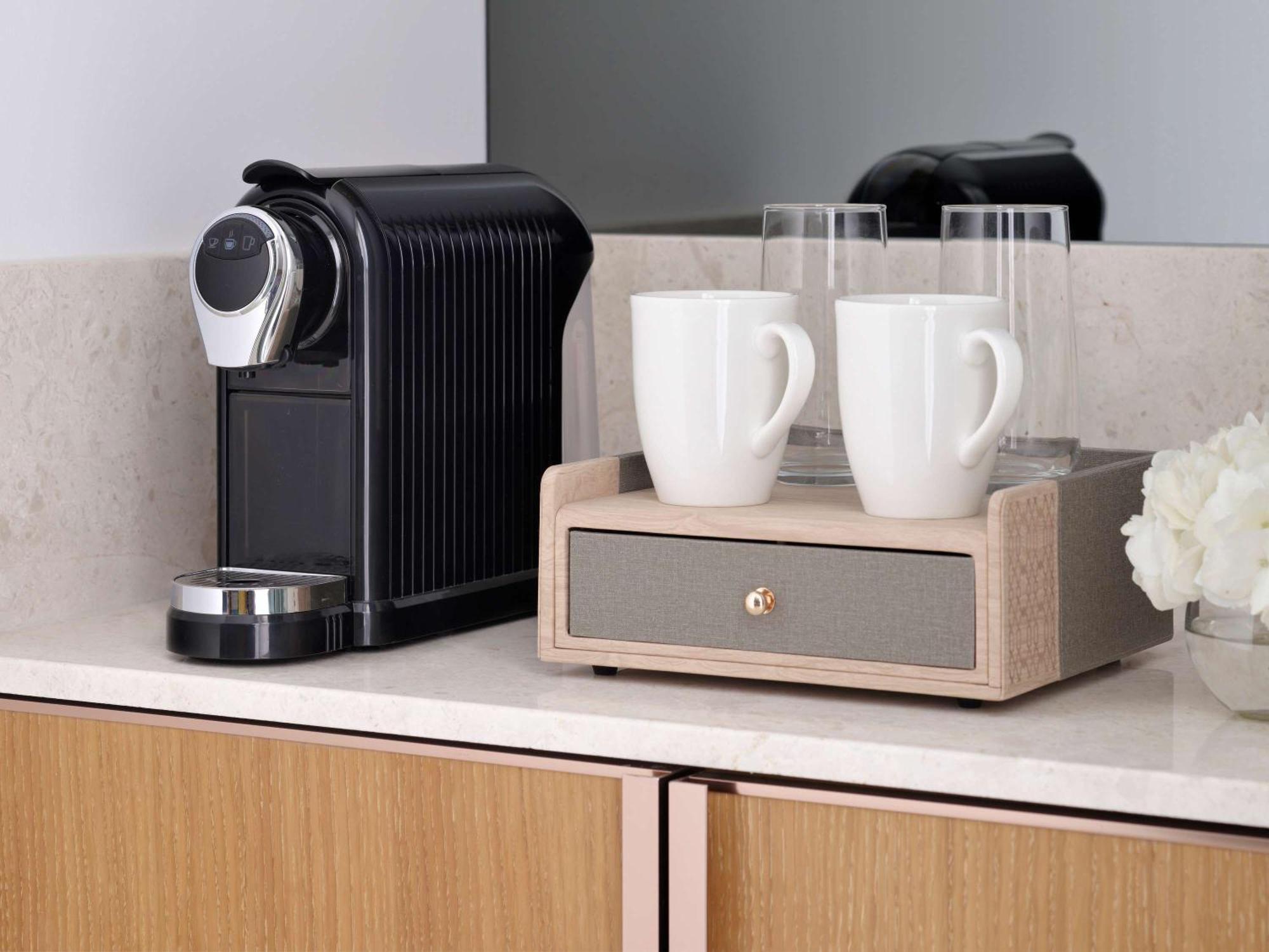 Moevenpick Hotel & Apartments Ghala Muscat Exteriör bild A Nespresso coffee machine