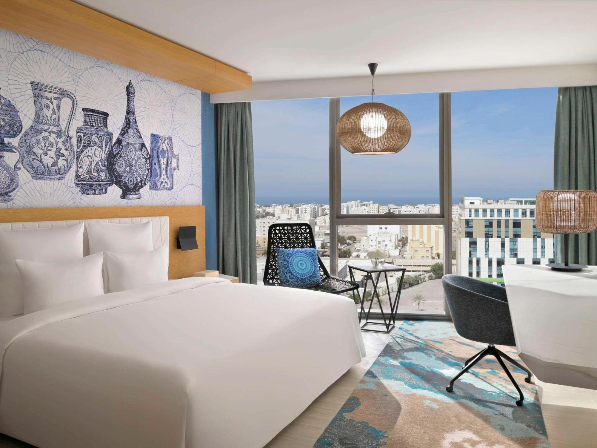 Moevenpick Hotel & Apartments Ghala Muscat Exteriör bild Deluxe Room