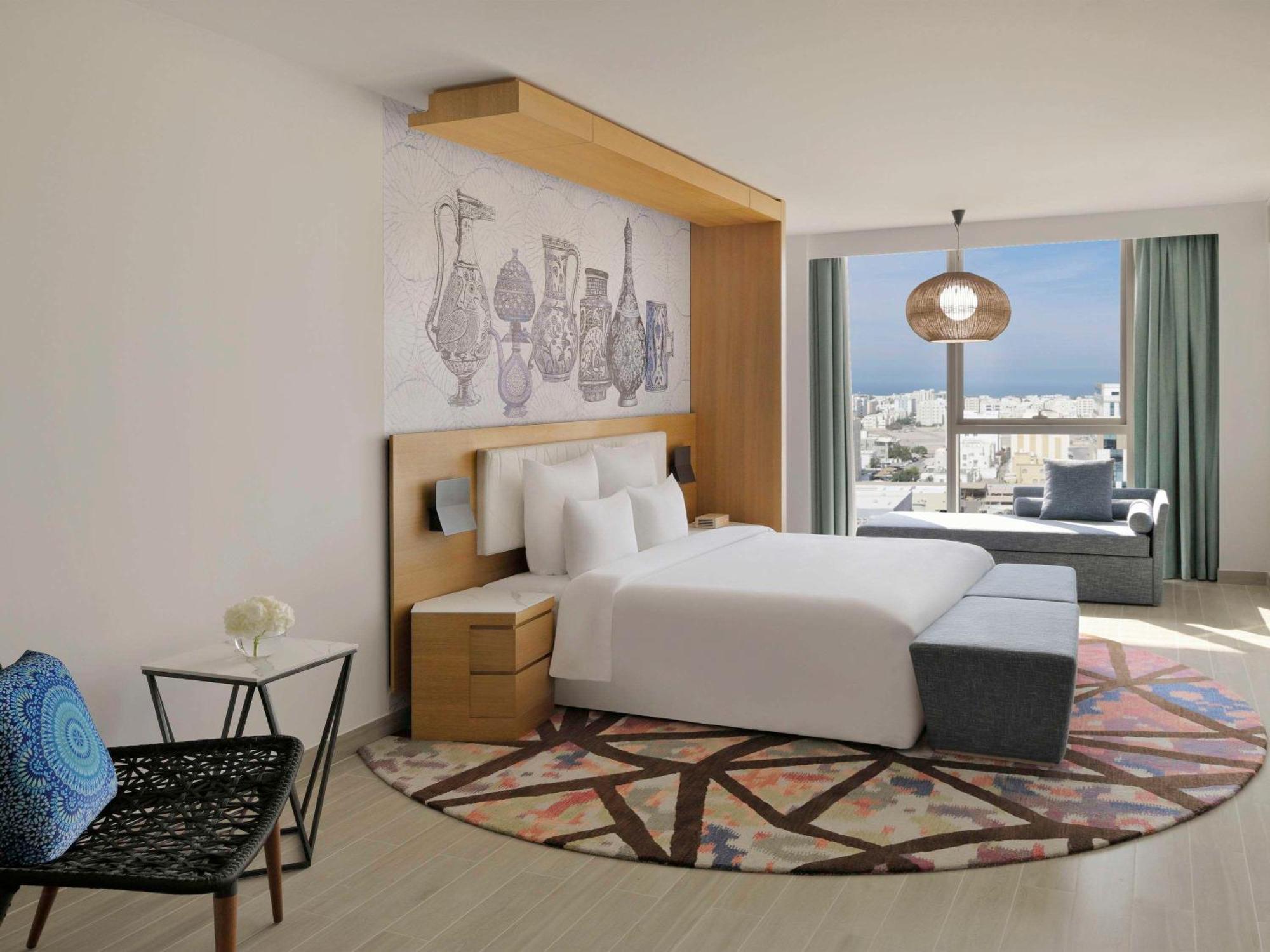 Moevenpick Hotel & Apartments Ghala Muscat Exteriör bild Deluxe room