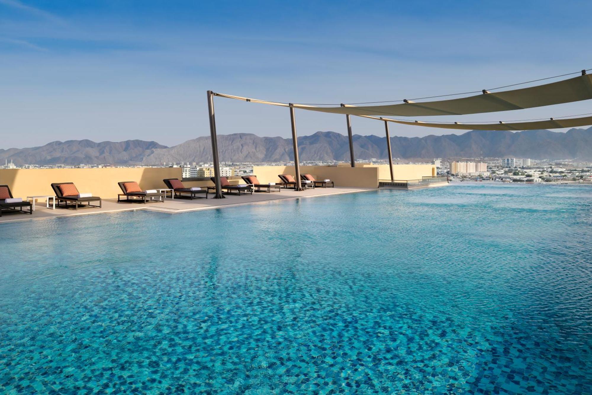 Moevenpick Hotel & Apartments Ghala Muscat Exteriör bild The pool at the Ritz-Carlton, Bahrain